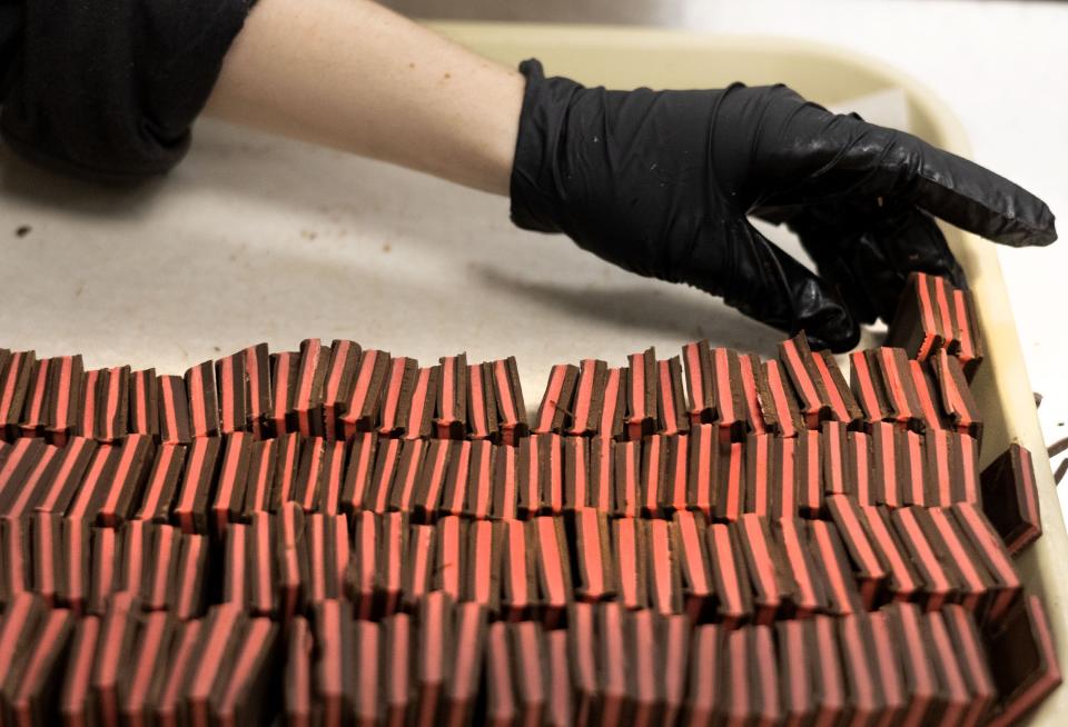 Chocolate sandwiches are handled at Fernwood Candy Company in Logan on Thursday, Nov. 30, 2023. | Laura Seitz, Deseret News