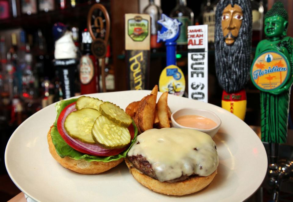 An original Double Roads favorite: Flame-broiled cheeseburgers served with pink 'Rock n Roll' sauce. Burgers will be on the menu at the new Double Roads, but the focus will be barbecue.
