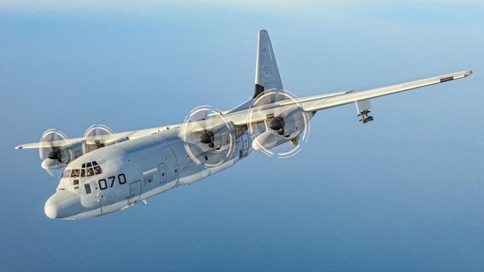 A U.S. Marine Corps KC-130J in the armed Harvest Hawk configuration with wing-mounted AGM-114 Hellfire missile. <em>Jamie Hunter</em>