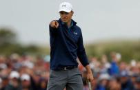 USA’s Jordan Spieth reacts after holing his eagle putt on the 15th hole during the final round REUTERS/Andrew Boyers