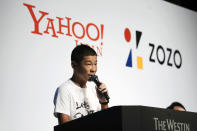 Zozo founder and Chief Executive Yusaku Maezawa speaks during a news conference Thursday, Sept. 12, 2019, in Tokyo. Yahoo Japan Corp. is putting up a tender offer, estimated at 400 billion yen ($3.7 billion), for Zozo Inc., a Japanese online retailer started by the celebrity tycoon. (AP Photo/Jae C. Hong)