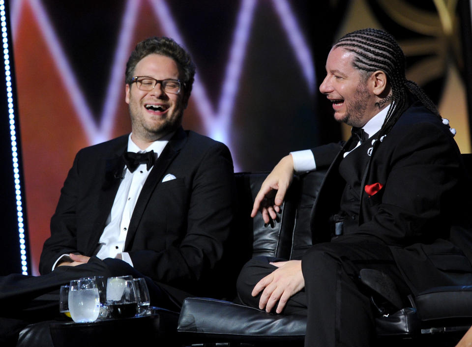 CULVER CITY, CA - AUGUST 25: Roast Master Seth Rogen and comedian Jeffrey Ross onstage during The Comedy Central Roast of James Franco at Culver Studios on August 25, 2013 in Culver City, California. The Comedy Central Roast Of James Franco will air on September 2 at 10:00 p.m. ET/PT.  (Photo by Kevin Winter/Getty Images for Comedy Central)