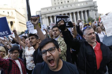 People protest against U.S. President Donald Trump's immigration policies in New York City, U.S., June 26, 2018. REUTERS/Brendan Mcdermid