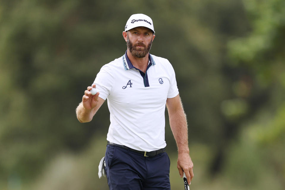 Dustin Johnson of the United States reacts to his putt on the seventh green during the first round of the 123rd U.S. Open Championship at The Los Angeles Country Club