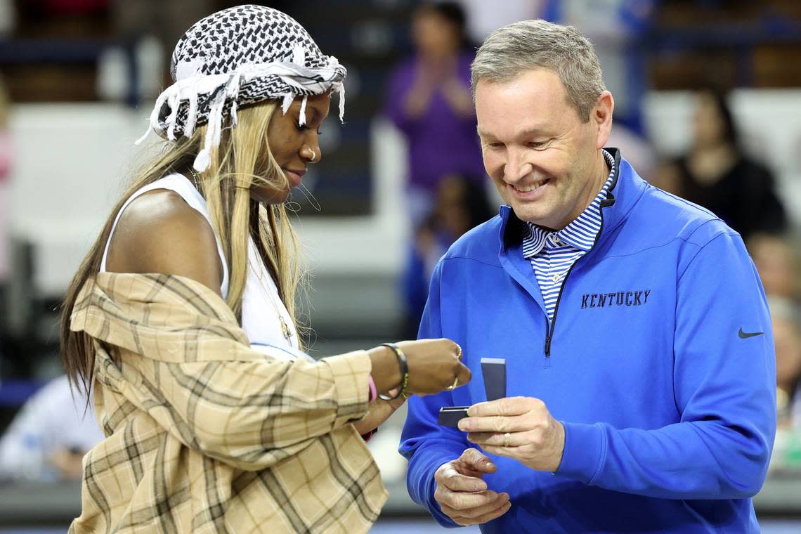 Former Kentucky great Rhyne Howard is presented her SEC Tournament championship ring from last season by Athletics Director Mitch Barnhart during halftime of Thursday night’s game in Memorial Coliseum.