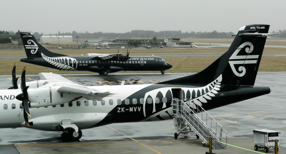 Air New Zealand planes at airport.