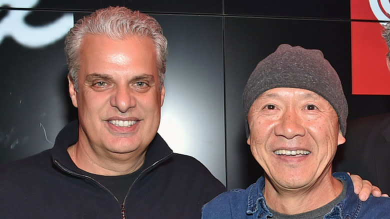 Masayoshi Takayama and Eric Ripert smiling at event