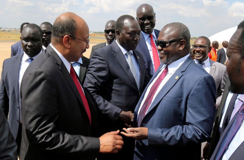 South Sudan's ex-vice President and former rebel leader Machar is received as he arrives at the Juba International Airport, in Juba