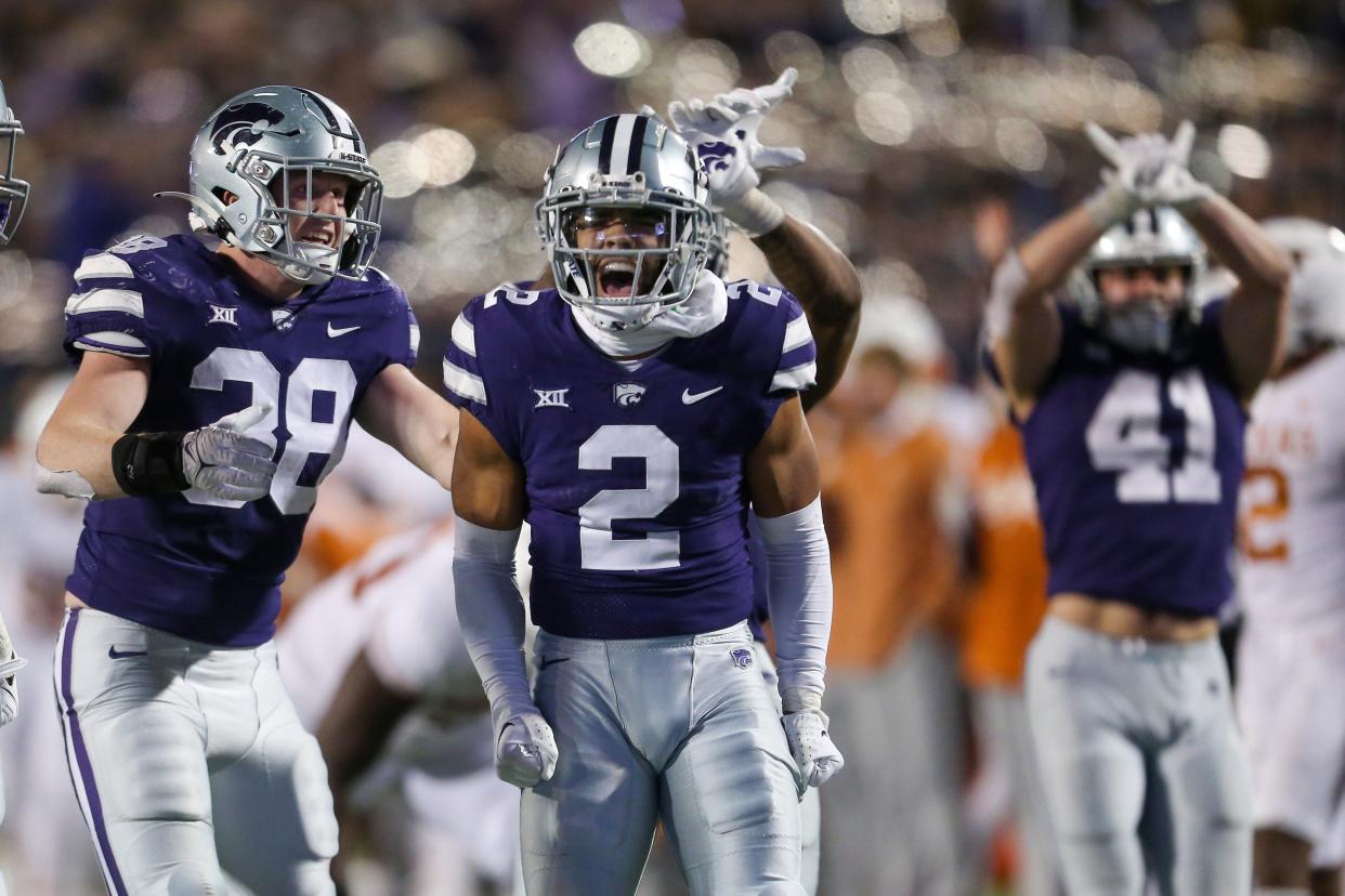 Kansas State safety Kobe Savage (2) celebrates after a defensive play last year against Texas at Bill Snyder Family Stadium.