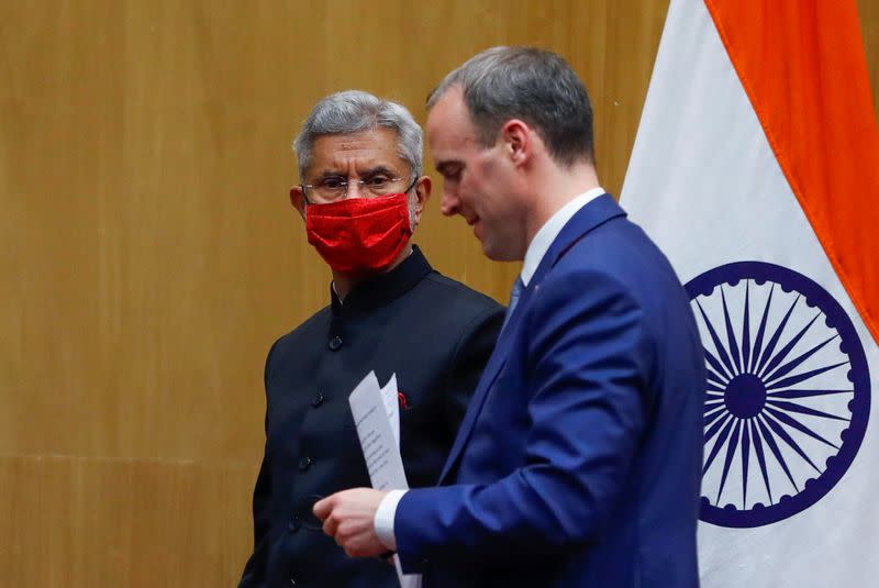 Britain's Foreign Secretary Raab and his Indian counterpart Jaishankar leave after a news conference in New Delhi