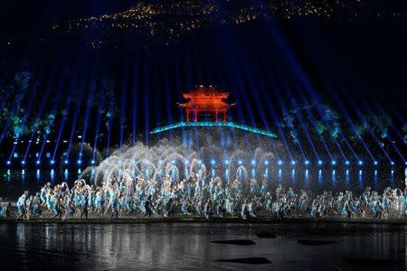 Performers give a performance during an evening gala for the G20 Summit at West Lake in Hangzhou, Zhejiang Province, China, September 4, 2016. Picture taken September 4, 2016. REUTERS/Stringer