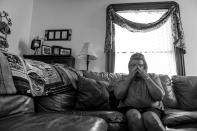 <p>Beth Genslinger mourns the death of her son Andy, who died from a heroin overdose in his bedroom in Germantown, Ohio. He is pictured on a blanket next to her.<br> (Photograph by Mary F. Calvert for Yahoo News) </p>