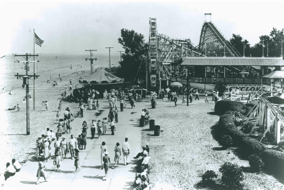 The classic Cedar Point Cyclone roller coaster pictured along the Lake Erie shore in Sandusky, Ohio. The wooden coaster was built in 1929.