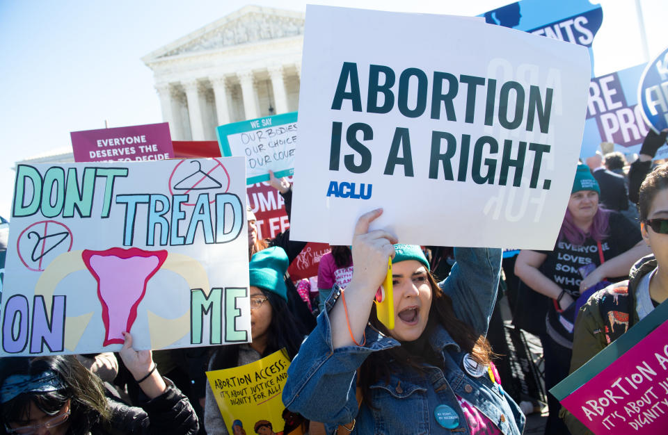 Pro-choice activists supporting legal access to abortion protest during a demonstration outside the US Supreme Court in Washington, DC, March 4, 2020