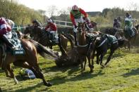 Britain Horse Racing - Grand National Festival - Aintree Racecourse - 8/4/17 Sam Waley-Cohen falls off the The Young Master during the 5:15 Randox Health Grand National Action Images via Reuters / Andrew Boyers Livepic