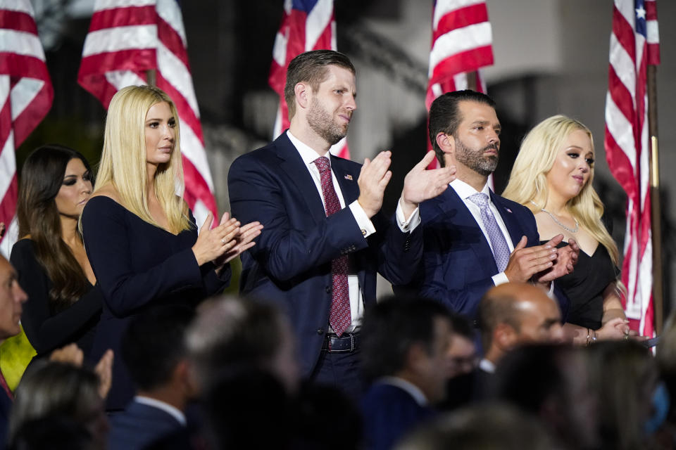 Ivanka Trump, Eric Trump, Donald Trump Jr. and Tiffany Trump stand and applaud