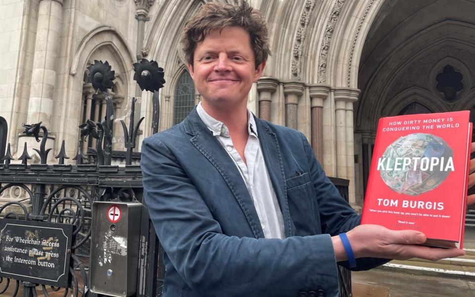 Tom Burgis outside of the Royal Courts of Justice in London after a high court judge dismissed a libel claim against him over his book, Kleptopia: How Dirty Money is Conquering the World. - Jess Glass / PA