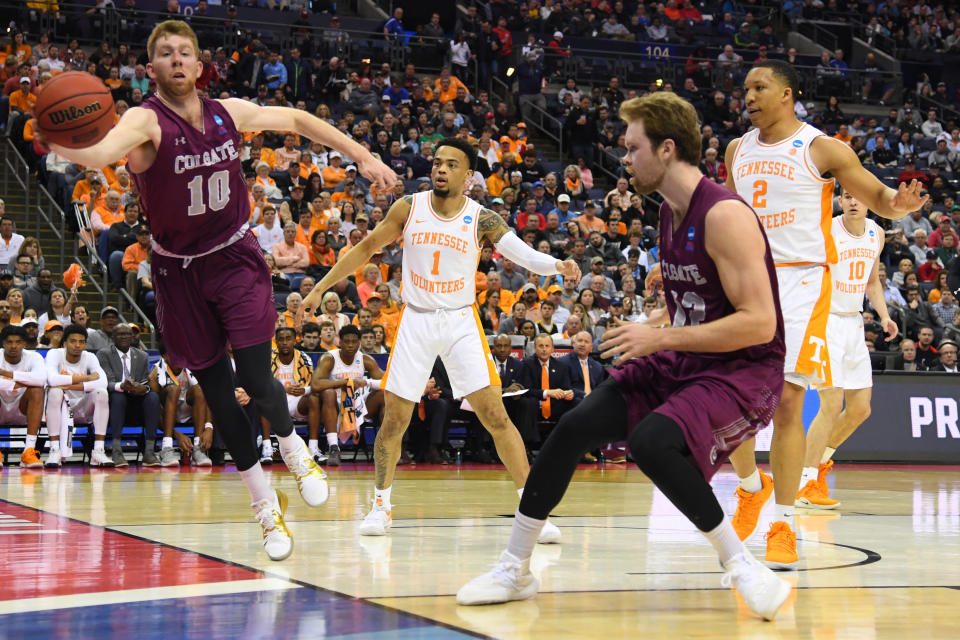 <p>Will Rayman #10 of the Colgate Raiders save the ball from going out of bnounds against Tennessee Volunteers in the first round of the 2019 NCAA Men’s Basketball Tournament held at Nationwide Arena on March 22, 2019 in Columbus, Ohio. (Photo by Jamie Schwaberow/NCAA Photos via Getty Images) </p>