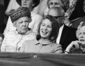 <p>Princess Anne is spotted laughing in the crowd.</p>