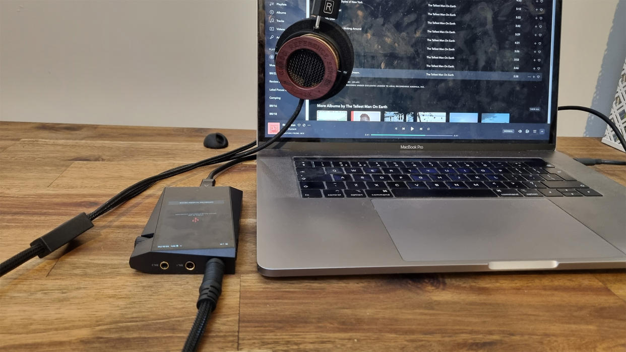  Astell & Kern A&norma SR35 plugged into a laptop and headphones. 
