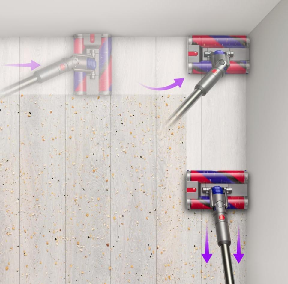 Dyson vacuum demonstrating versatility with attachments for floor and ceiling cleaning