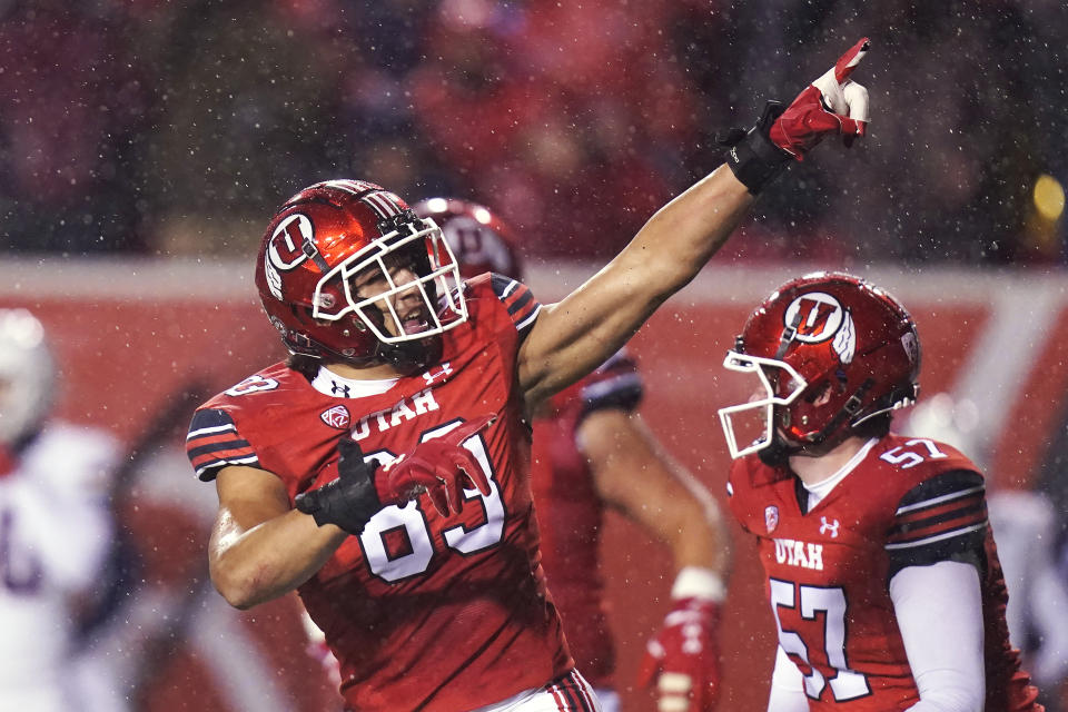 Utah defensive end Jonah Elliss (83) celebrates a fumble recovery against Arizona during the first half of an NCAA college football game Saturday, Nov. 5, 2022, in Salt Lake City. (AP Photo/Rick Bowmer)