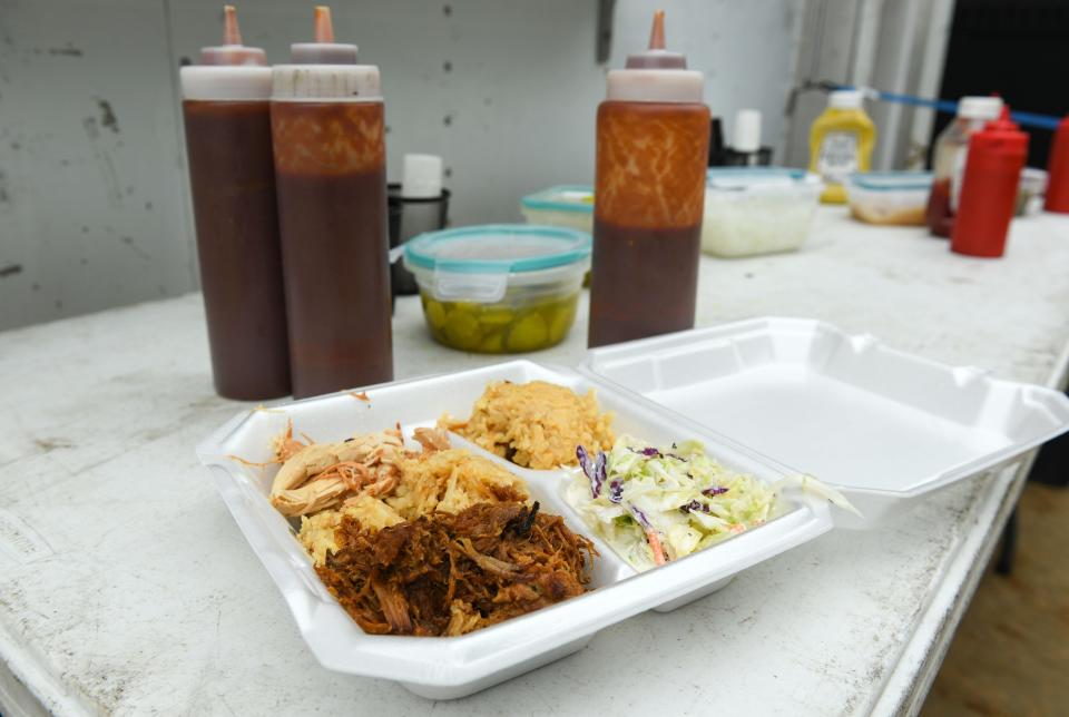 A plate sits full of food at Berke's BBQ food truck on Friday, April 22, 2022, in Sioux Falls.