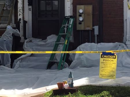 FILE PHOTO: A home at Fort Benning undergoes lead paint removal as the U.S. Army mobilizes to protect residents against lead poisoning hazards in Fort Benning, Georgia, U.S., September 10, 2018. REUTERS/Andrea Januta/File Photo