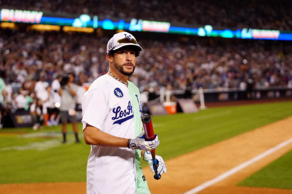 LOS ANGELES, CA - JULY 16:  Bad Bunny looks on during the MGM All-Star Celebrity Softball Game at Dodger Stadium on Saturday, July 16, 2022 in Los Angeles, California. (Photo by Daniel Shirey/MLB Photos via Getty Images)