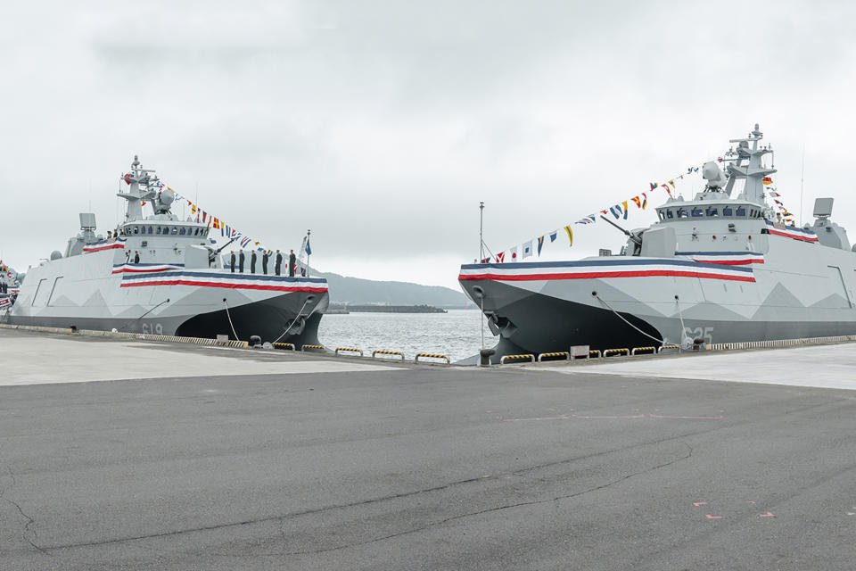 In this photo released by the Taiwan Presidential Office, newly commissioned navy ships are seen in the northern Taiwan port of Suao on Tuesday, March 26, 2024. Taiwan has commissioned two new navy ships as a safeguard against the rising threat from China, which has been ratcheting up its naval and air force missions around the island that it claims as its own territory to be annexed by force if necessary. The pair of Tuo Chiang class corvettes completes the first order of six of the domestically produced catamarans with stealth capabilities. (Taiwan Presidential Office via AP)