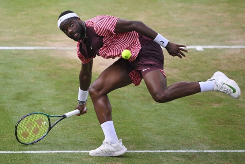 American tennis player Frances Tiafoe in action against Germany's Jan-Lennard Struff during their men's singles final match of the Stuttgart Open. Defending champion Frances Tiafoe and runner-up  Jan-Lennard Struff have been confirmed as entries for the Stuttgart grass court ATP tournament in June, organizers said on Friday. Marijan Murat/dpa