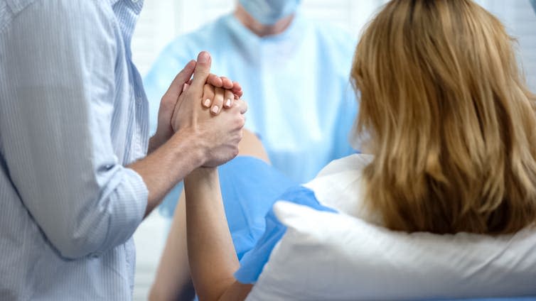 <span class="caption">Hypnobirthing may help women feel more relaxed during labour.</span> <span class="attribution"><a class="link " href="https://www.shutterstock.com/image-photo/closeup-man-holding-wife-hand-support-1537325582?src=5644f2e9-36df-4520-88e1-8c8a619c2878-1-18" rel="nofollow noopener" target="_blank" data-ylk="slk:Motortion Films/ Shutterstock;elm:context_link;itc:0;sec:content-canvas">Motortion Films/ Shutterstock</a></span>