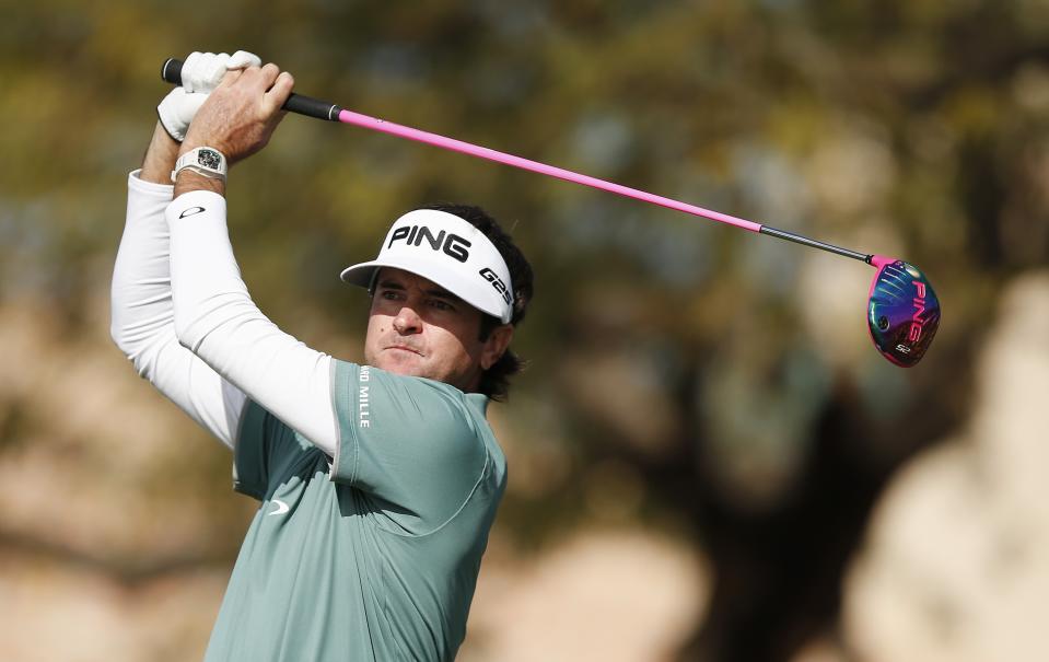 Bubba Watson hits a tee shot at the second hole during the third round of the Phoenix Open golf tournament, Saturday, Feb. 1, 2014, in Scottsdale, Ariz. (AP Photo/Ross D. Franklin)