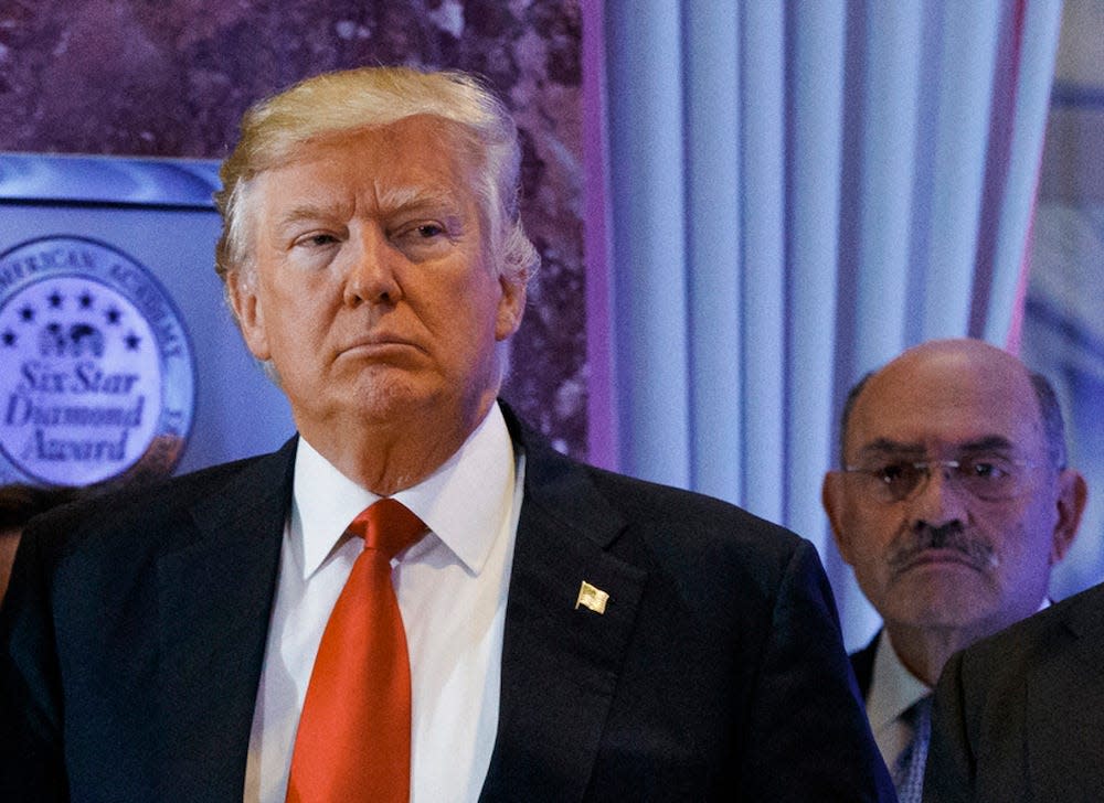 Former president Donald Trump is pictured with his former CFO Allen Weisselberg