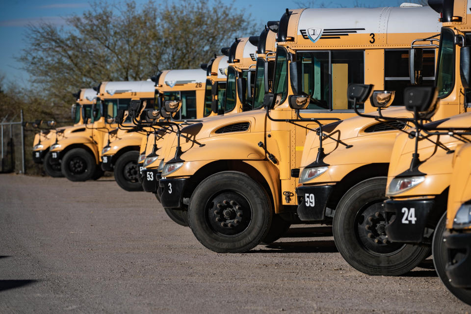 New buses are parked at the Student Transportation Specialists of New Mexico lot waiting to carry kids to and from school in Las Cruces on Friday, Jan. 14, 2022. STS-NM will add 100 new buses to its fleet this year.