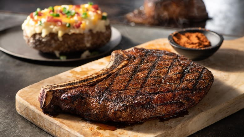 ribeye with loaded baked potato