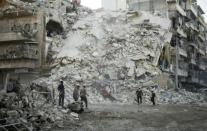 Syrian family among dead in new Aleppo strikes despite sanctions threat