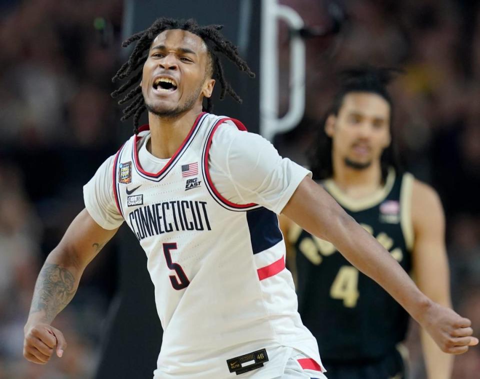 Connecticut Huskies guard Stephon Castle (5) celebrates after a foul call during the NCAA Men’s Basketball Tournament Championship against the Purdue Boilermakers, Monday, April 8, 2024, at State Farm Stadium in Glendale, Ariz.