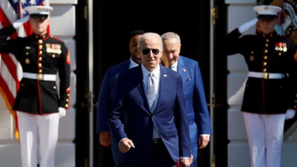 PHOTO: President Joe Biden walks to deliver remarks and sign the CHIPS and Science Act of 2022, on the South Lawn of the White House in Washington, Aug. 9, 2022. (Evelyn Hockstein/Reuters)