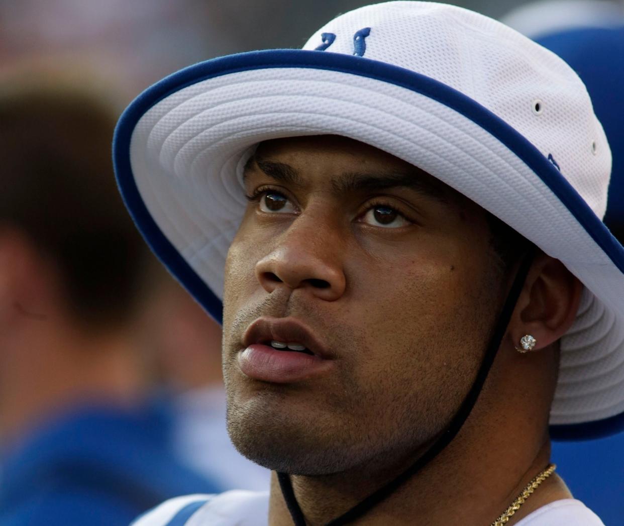 Mandatory Credit: Photo by Tom Uhlman/AP/Shutterstock (9273341k)Indianapolis Colts strong safety LaRon Landry watches from the sidelines in the first half of an NFL preseason football game against the Cincinnati Bengals, in CincinnatiColts Bengals Football, Cincinnati, USA - 28 Aug 2014.