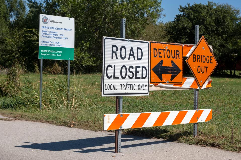 Signs for a closed bridge are pictured looking north on Midwest Boulevard, just north of NE 36 in Oklahoma City, Tuesday, Sept. 26, 2023