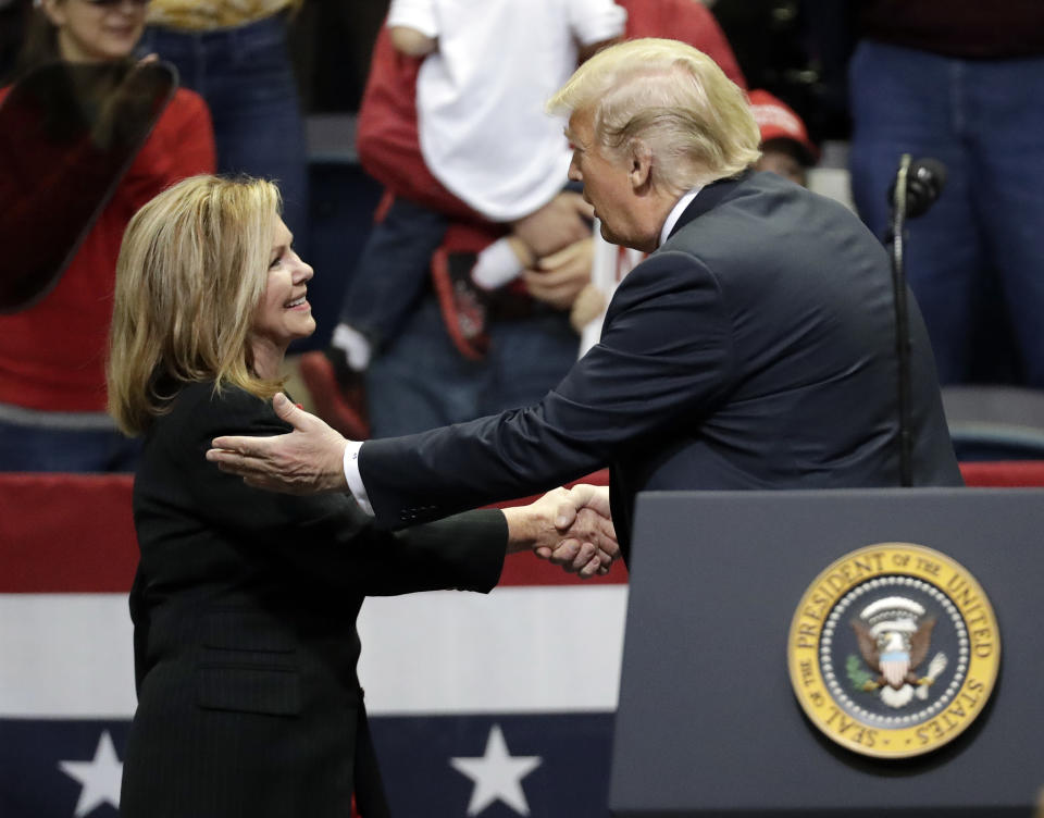 President Donald Trump introduces Rep. Marsha Blackburn, R-Tenn., at a rally Sunday, Nov. 4, 2018, in Chattanooga, Tenn. (AP Photo/Mark Humphrey)