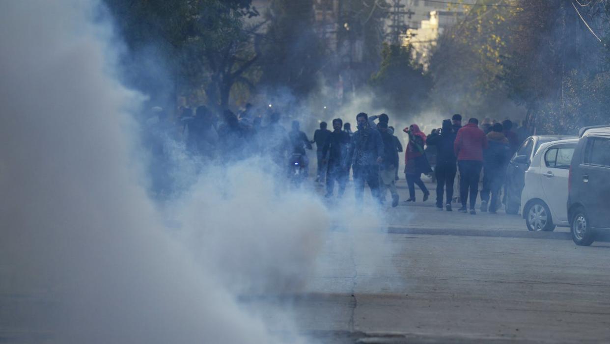 Like at this pro-PTI protest, the smoke has yet to clear following Pakistan's election. <a href="https://www.gettyimages.com/detail/news-photo/supporters-of-khans-pakistan-tehreek-e-insaf-party-run-from-news-photo/1995105733?adppopup=true" rel="nofollow noopener" target="_blank" data-ylk="slk:M Asim Khan/AFP via Getty Images);elm:context_link;itc:0;sec:content-canvas" class="link ">M Asim Khan/AFP via Getty Images)</a>