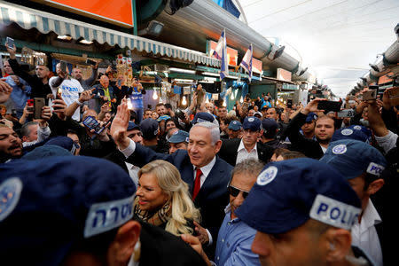 Israel Prime Minister Benjamin Netanyahu and his wife Sara visit a market in Tel Aviv, Israel April 2, 2019. REUTERS/Tomer Appelbaum