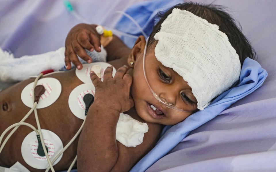 A sick baby receives treatment at the hospital - Melanie Swan/Red Crescent