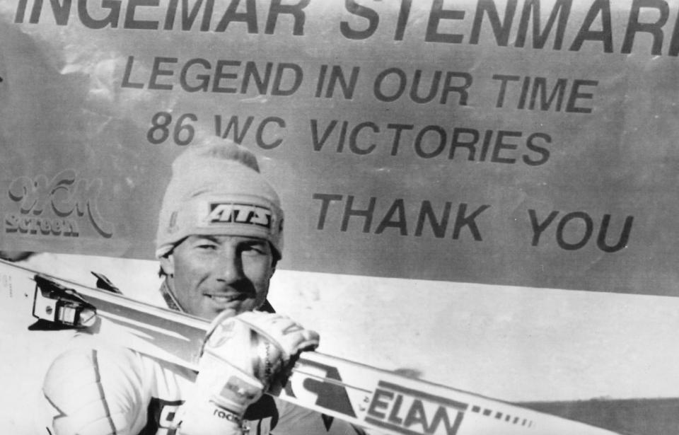 FILE - Ingemar Stenmark of Sweden walks by a flag which says all about him - Legend in our time - after the Swedish ace skier finished fourth in the World Cup Men's Giant Slalom Thursday, March 9, 1989, at Shiga Heights, Japan. Ingemar Stenmark's unbreakable skiing record just got matched by Mikaela Shiffrin. The American won a giant slalom on Friday, March 10, 2023, to equal the Swedish great's record of 86 World Cup victories, which he set more than three decades ago. (AP Photo/Shizua Kambayashi, File)