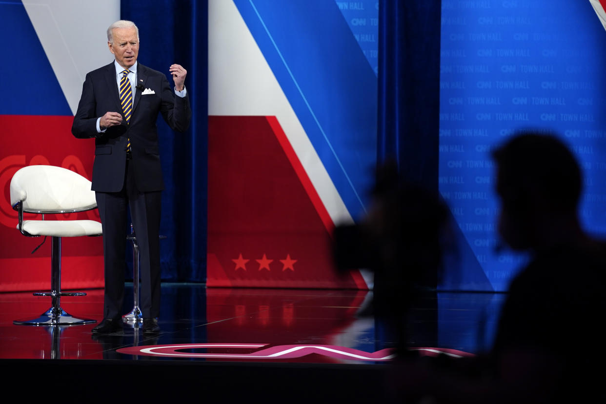 President Joe Biden talks during a televised town hall event at Pabst Theater, Tuesday, Feb. 16, 2021, in Milwaukee. (AP Photo/Evan Vucci)