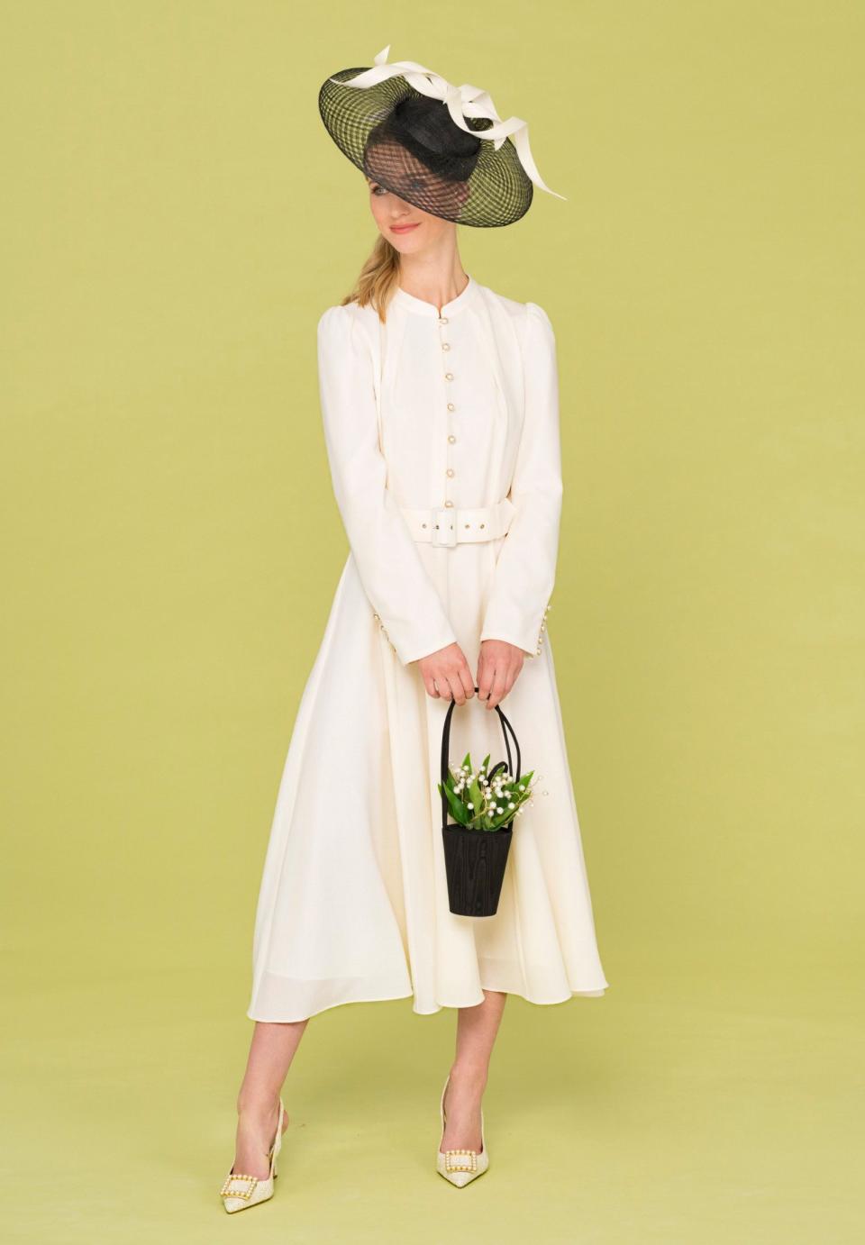 Wool crepe dress, £795, Beulah; Tweed shoes, £295, Russell & Bromley; Hat, £2,450, Jane Taylor London; Satin bag, £345, Lulu Guinness; Pearl and diamond earrings, £1,800, Kiki McDonough