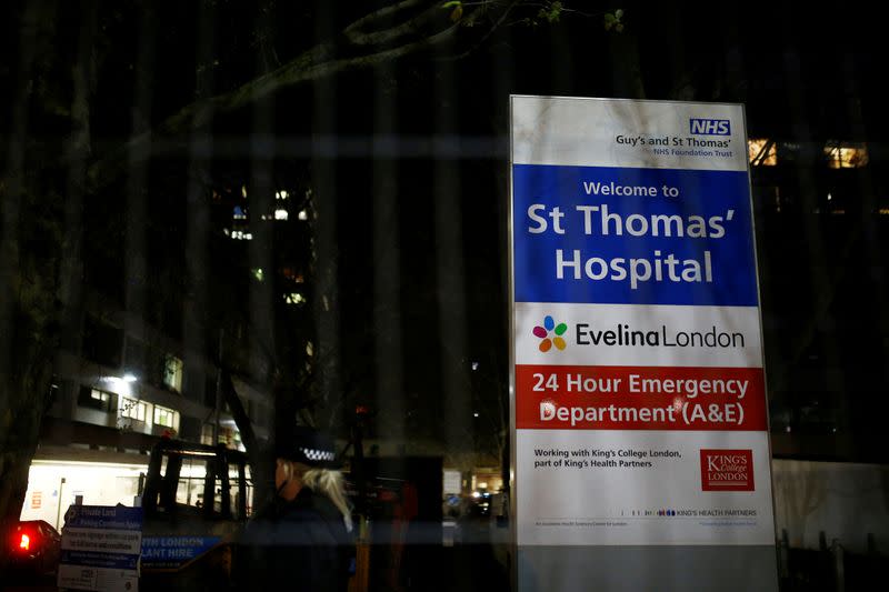 A police officer is seen in the St Thomas' Hospital after British Prime Minister Boris Johnson was moved to intensive care