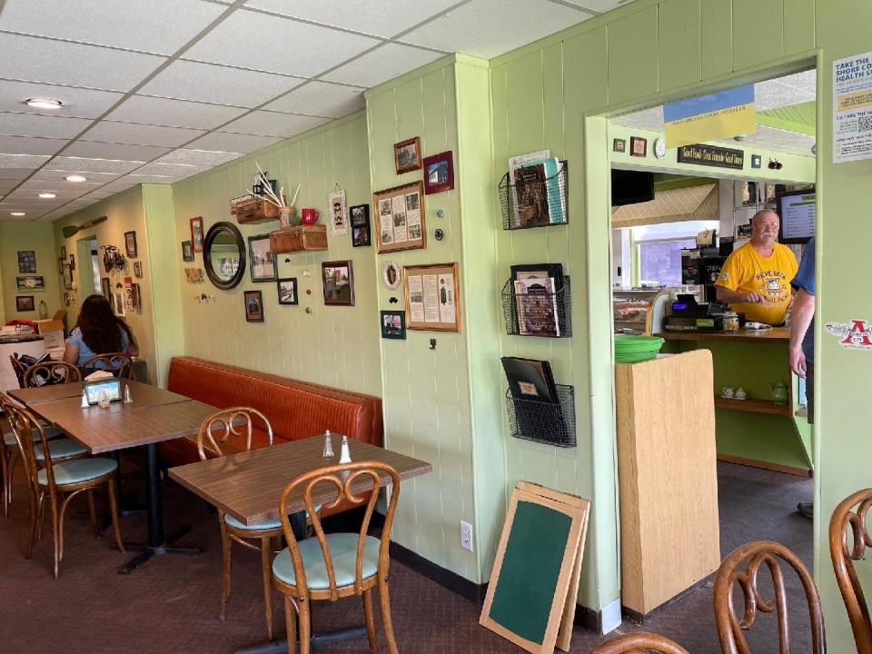 Local history pieces line the walls of Kurt Schulz Delicatessen and Pastry Shoppe.